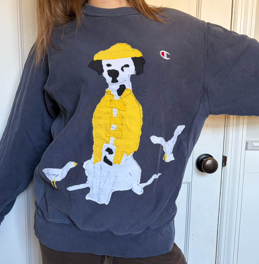 Dog in Raincoat on Navy Crewneck